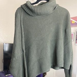 Green turtleneck sweater